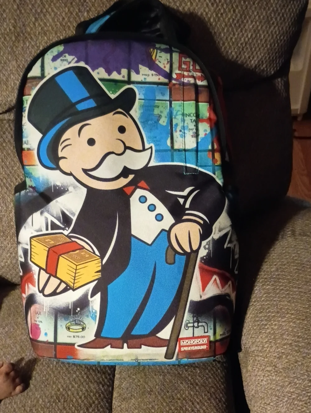 Sprayground Blue, Black and White Monopoly Character Backpack Print